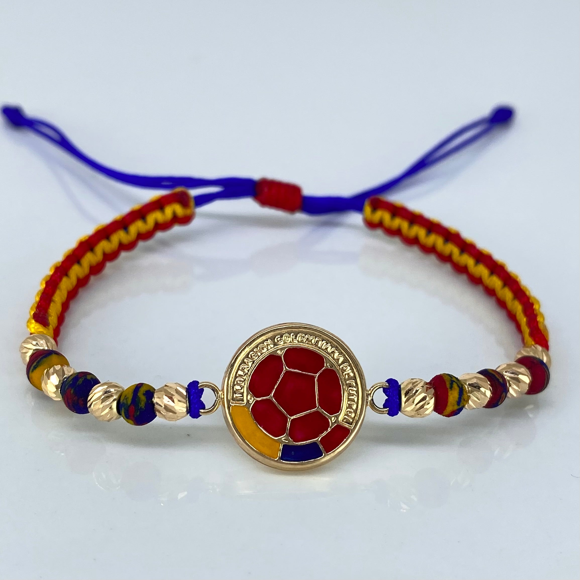 Pulsera tejida Colombia Herraje Balon Futbol / BD 8uni 4mm / Hilo Colores Neoprenos Oro amarillo · 1,72 g