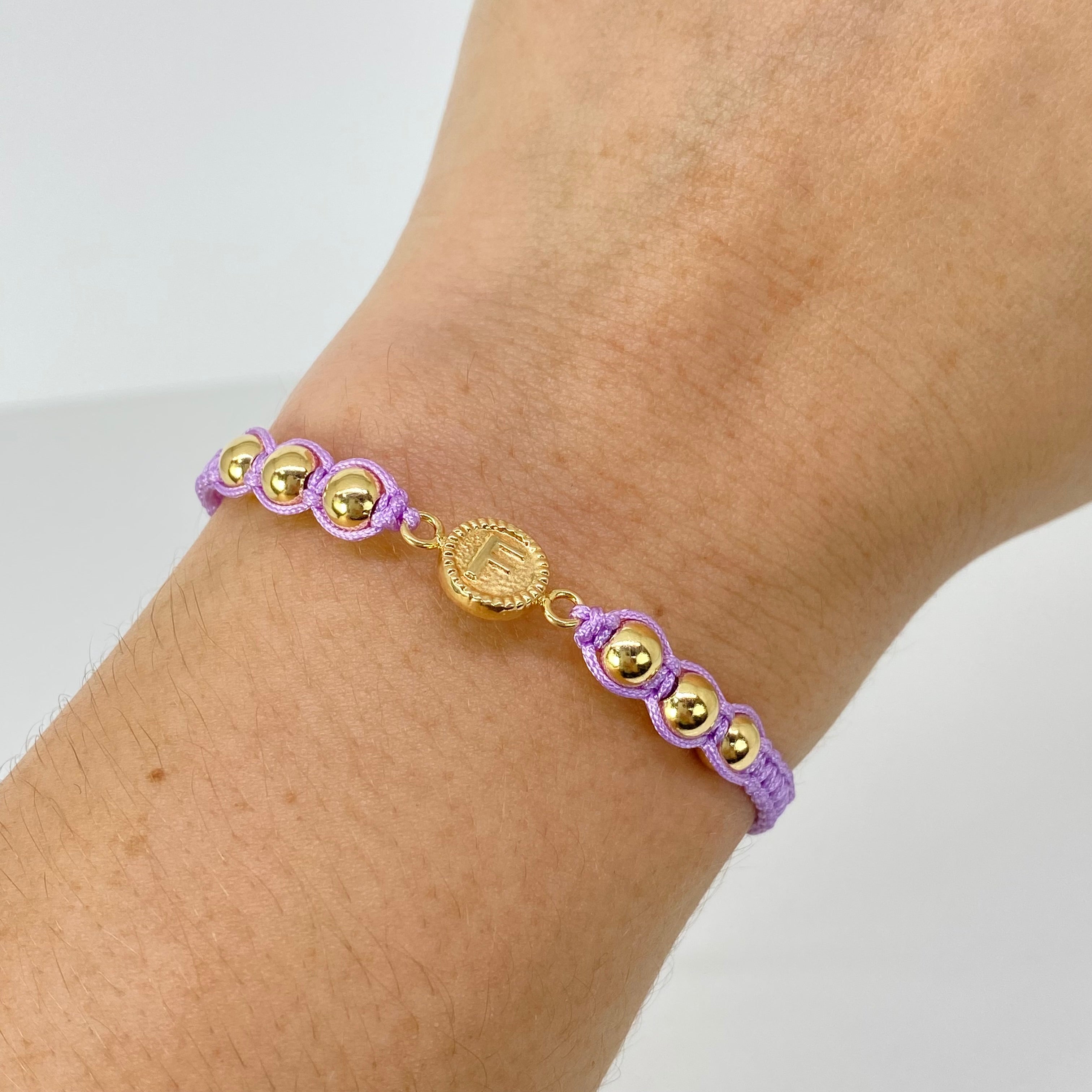 Pulsera tejida Herraje Letra F BL 6uni 5mm Hilo Lila Oro amarillo 18k · 1,02 g 2