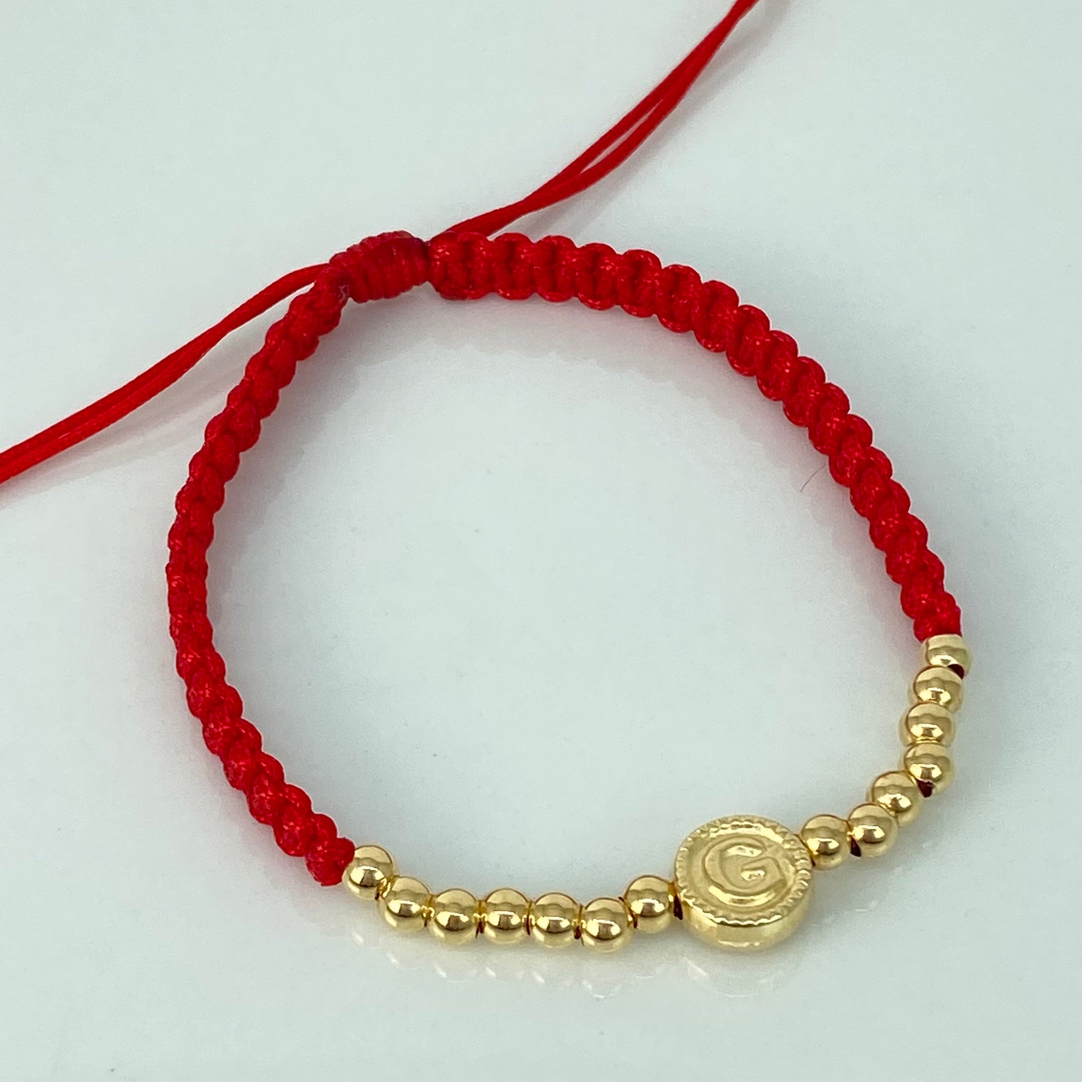 Pulsera tejida Herraje Letra G / BL 14uni 3mm / Hilo Rojo Oro amarillo 18k · 1,07 g 2