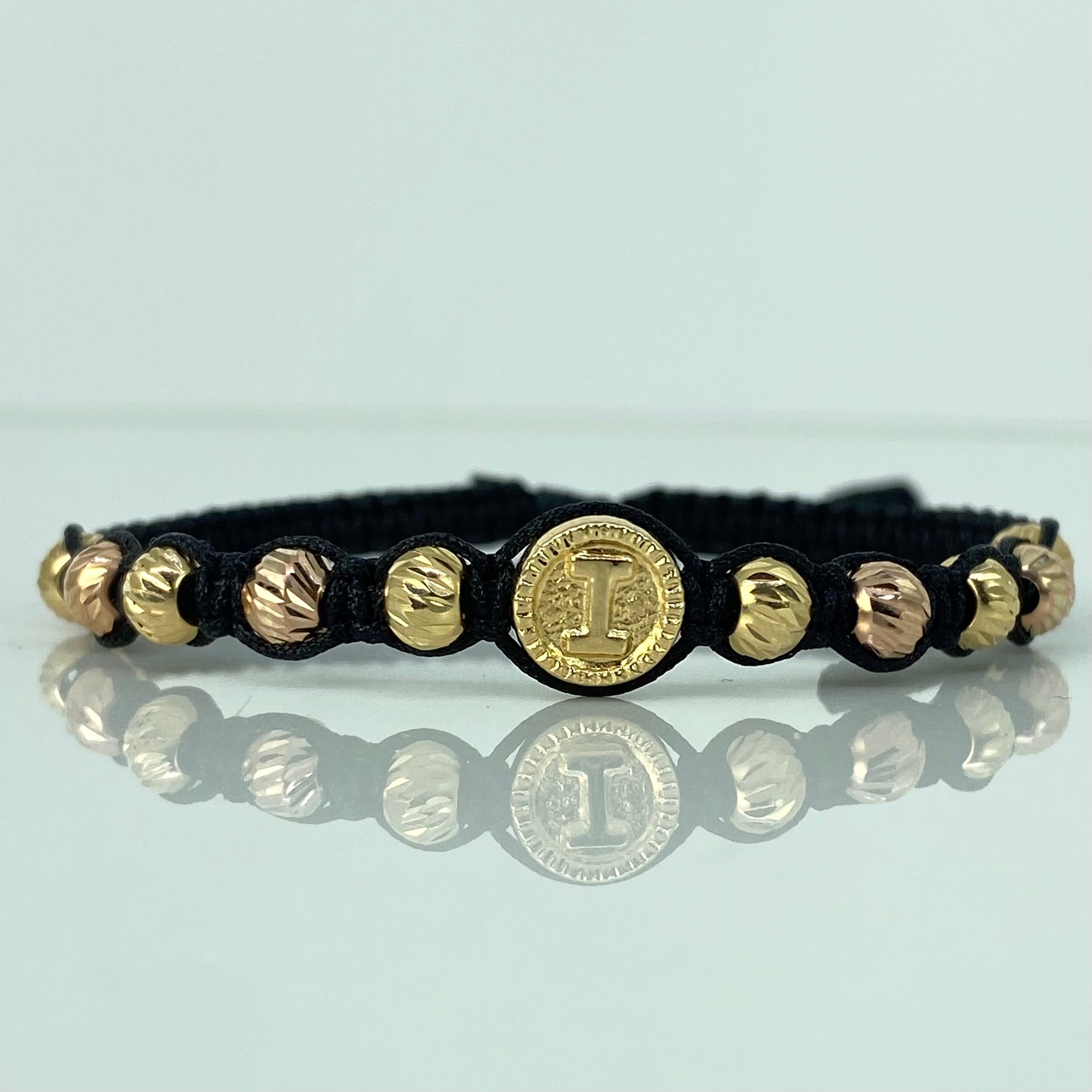 Pulsera tejida Herraje Letra I / BD 10uni 5mm / Hilo Negro Oro amarillo y Oro rosa 18k · 1,3 g 2